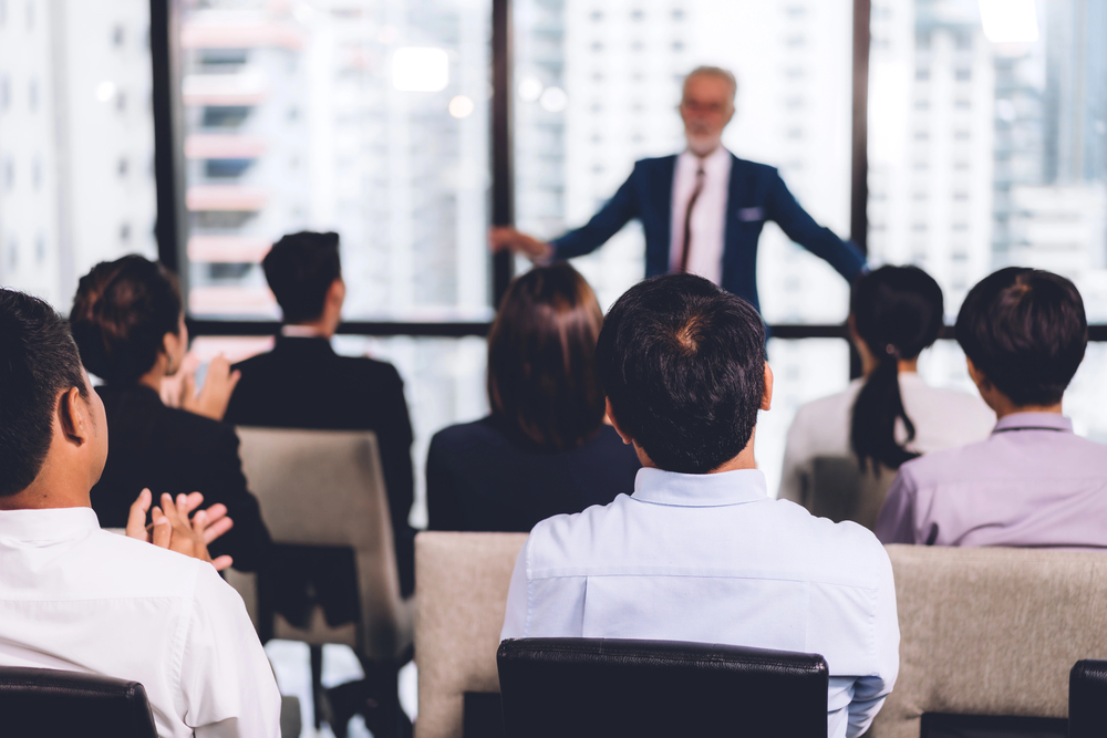 Business presentation in modern office setting.
